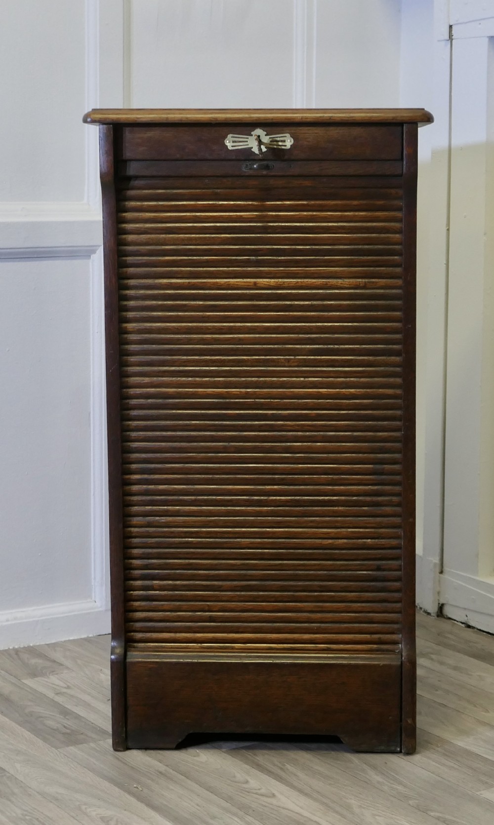 art deco tambour fronted oak filing cabinet