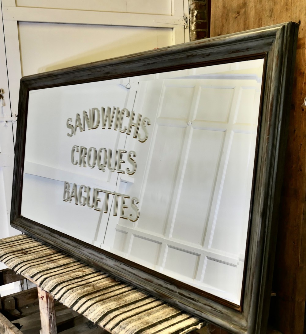 huge brasserie advertising mirror sandwiches croques baguettes