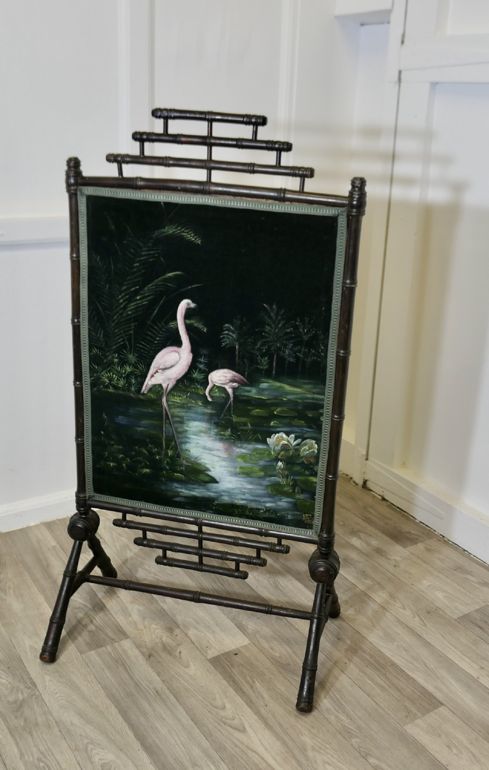 black lacquer oriental fire screen painted with flamingos