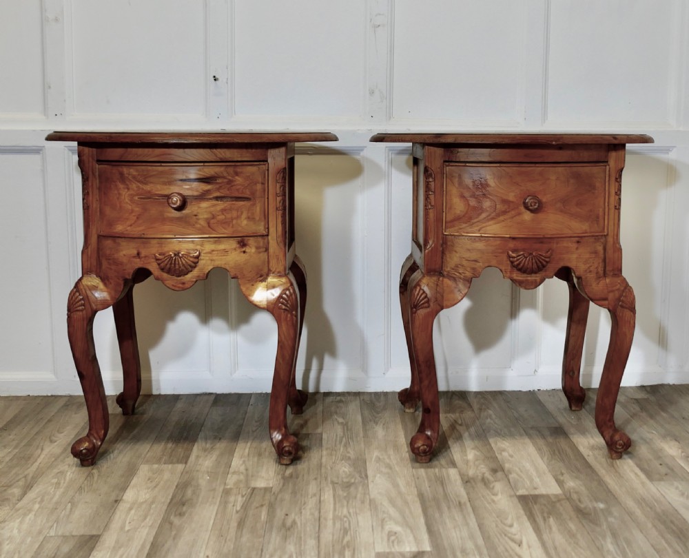 a pair of heavy pine side tables or bedside cabinets