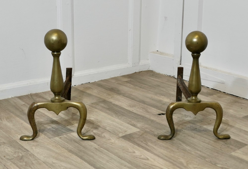 a chunky pair of french 19th century brass andirons or fire dogs