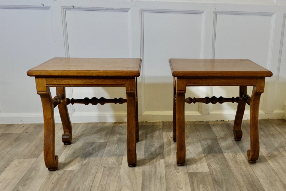 a pair of french arts and crafts oak stools