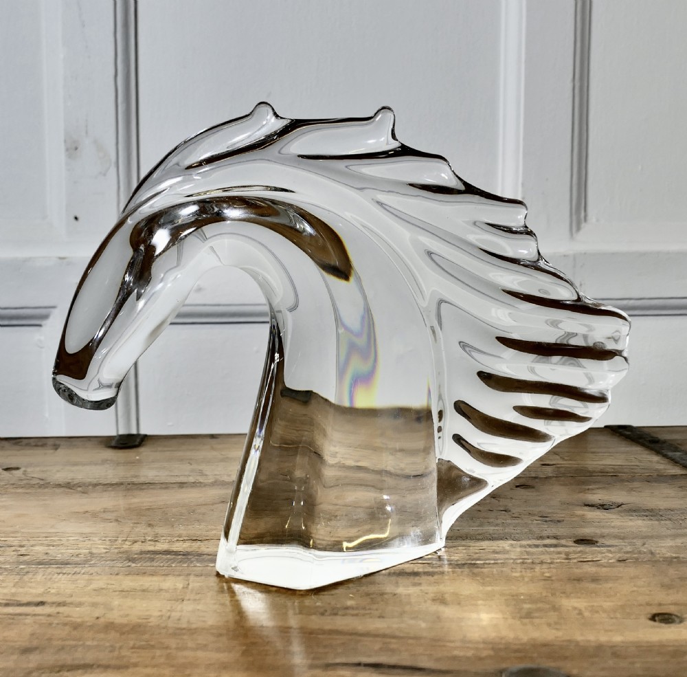 an elegant crystal head of a horse signed by daum of nancy france