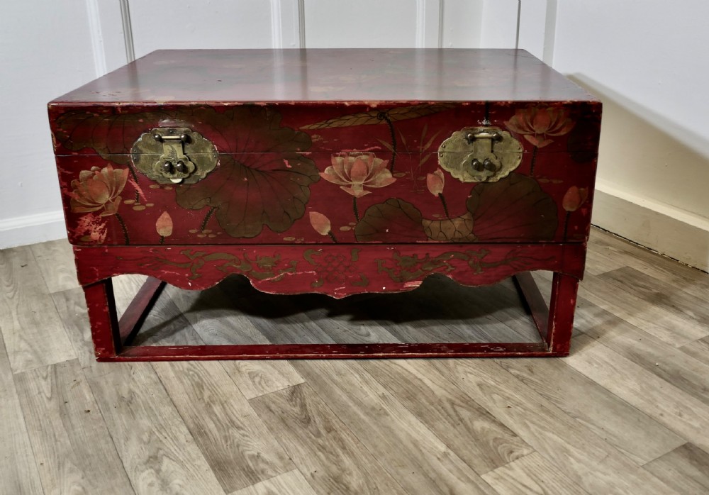 a large chinoiserie marriage chest on stand