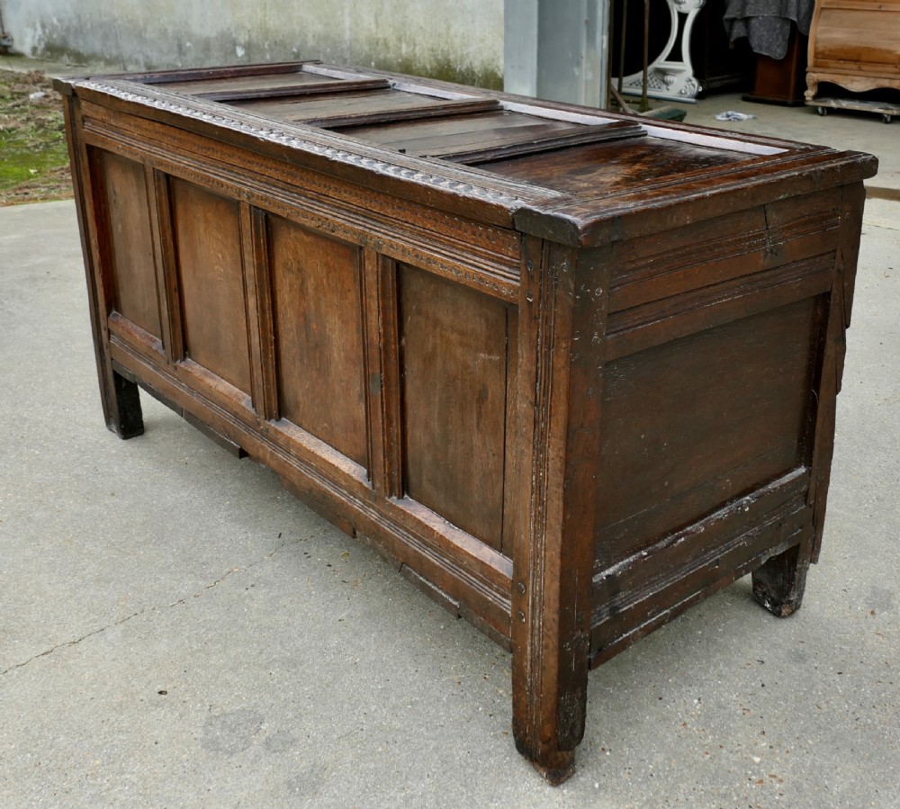 a large 17th century panelled oak coffer