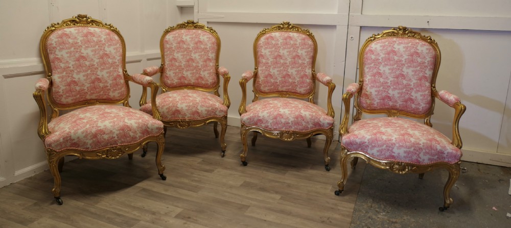 a superb set of four french napoleon iii gilt salon chairs