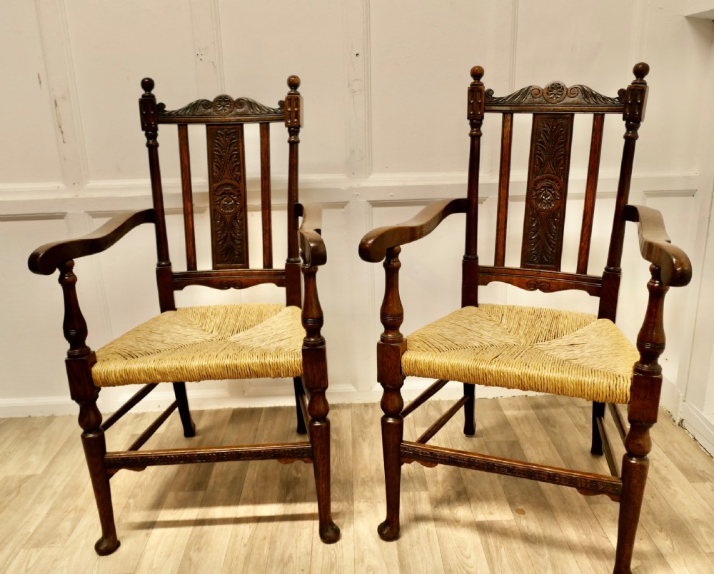 pair of excellent quality gothic carved oak carver chairs