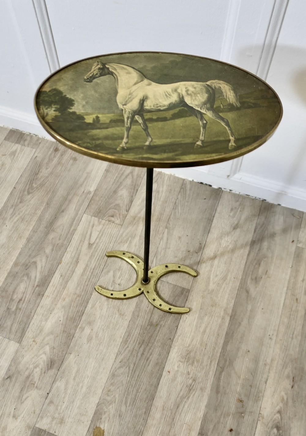 petite french brass wine table on a horse riding theme