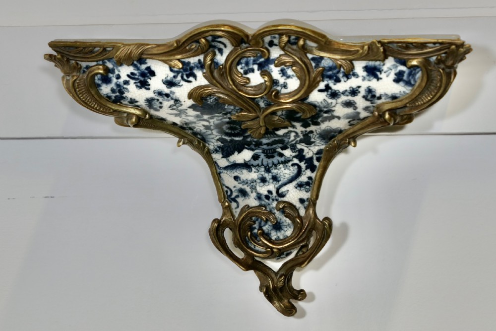 blue and white ceramic and ormolu wall bracket