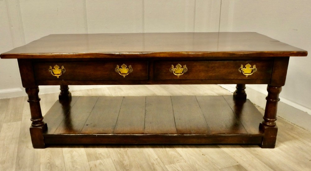 a large traditionally made oak plank top coffee table