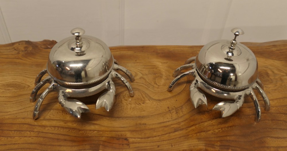 a pair of counter top courtesy crab bells